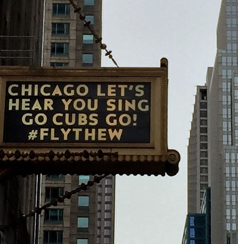 Cubs Win, Strangers Hug.