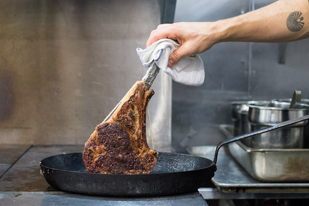 The pan, the chef, and the tattoo combined cost less than the steak. Roughly.