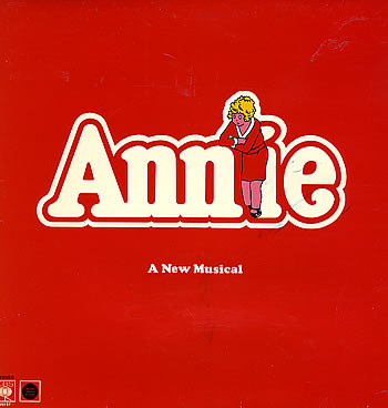 A 12'' vinyl record suits a 42'' female child.